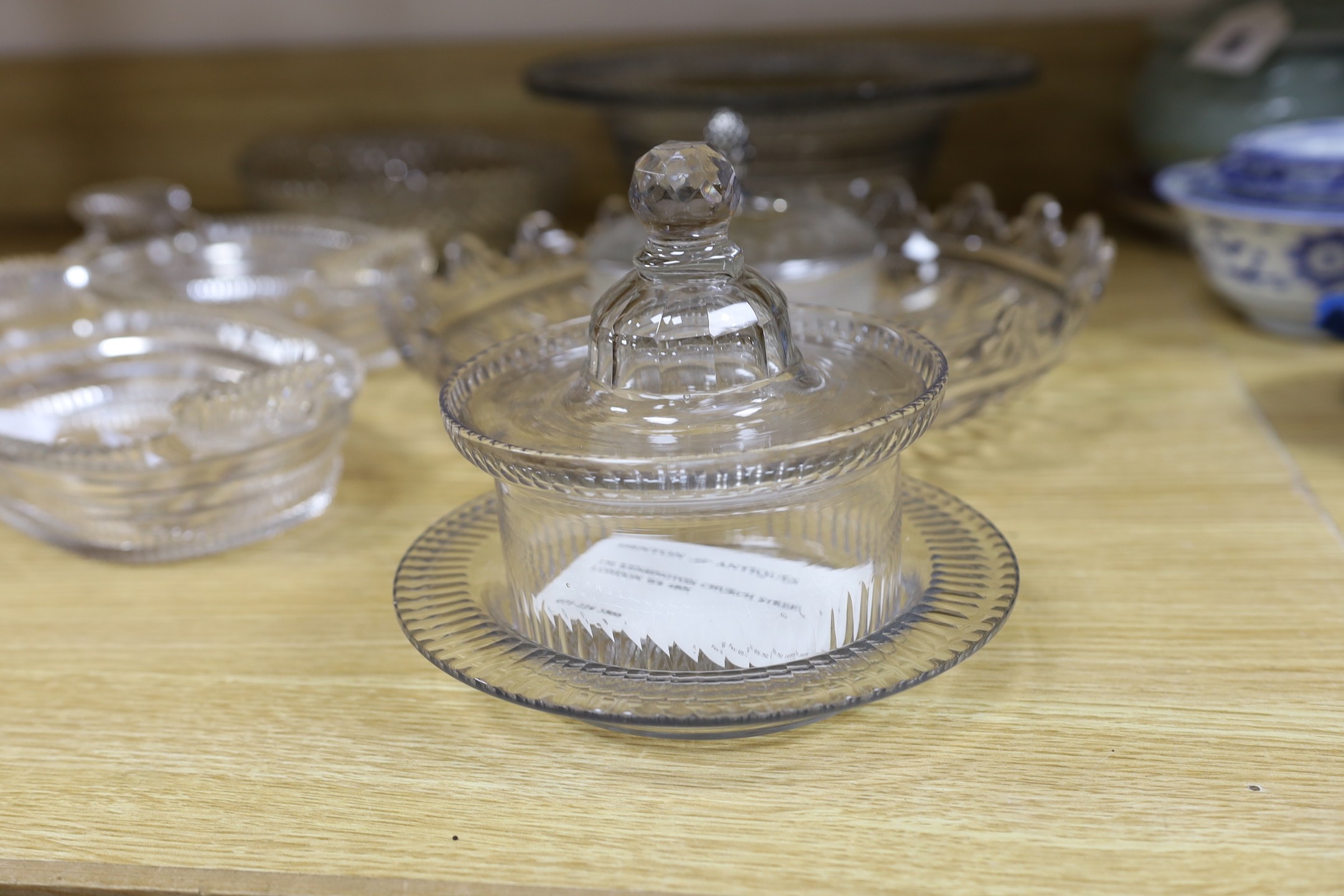 A selection of various late Georgian cut glass dishes, and a later silver mounted pineapple lidded pot and others